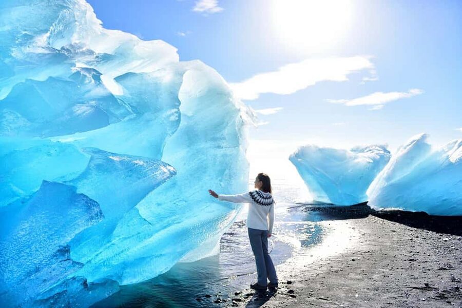 2-Day South Coast, Blue Ice Cave, Glacier Lagoon Tour - Day 1: Waterfalls, black sand, and the long road east