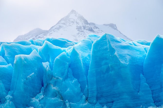 6-Day Summer Ring Route of Iceland Small-Group Tour - Day 2: Waterfalls, black sand, and the Katla ice cave