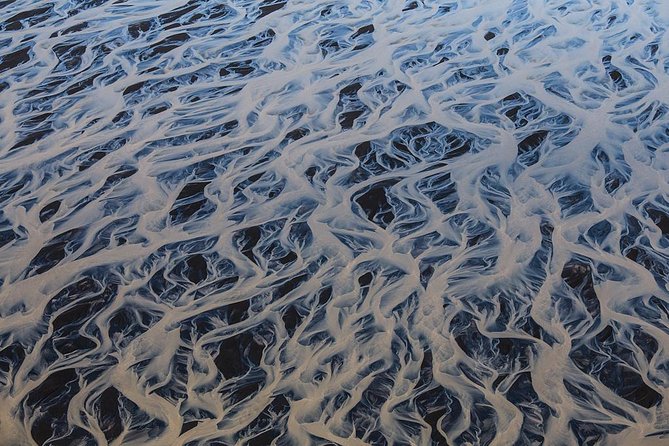 Airplane tour over black sands and riverbeds from Skaftafell - The pilot’s role and the value of local explanation