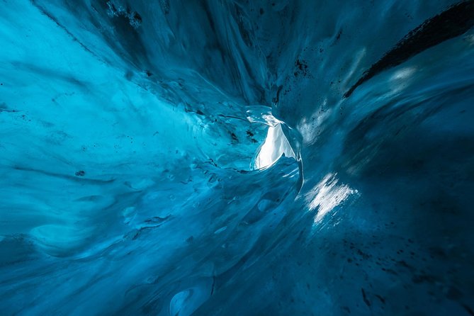 Blue Ice Cave Adventure - Hiking across rough ground to the cave