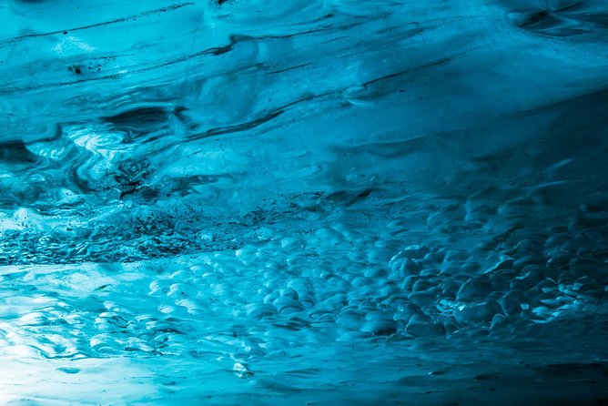 Blue Ice Cave Adventure - Entering a cave selected for the day