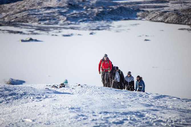 Crystal Treasures of Vatnajökull: Ice Cave Adventure - Walking to the Naturally Formed Ice Cave