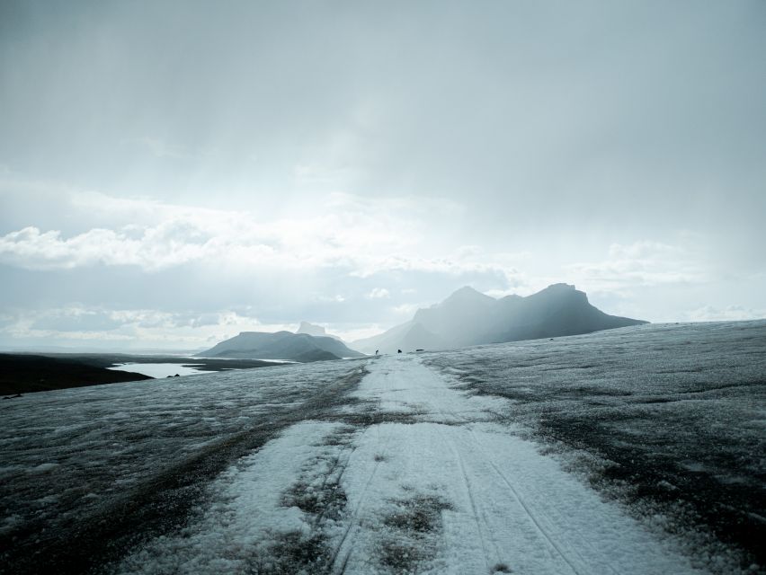 From Gullfoss: Langjökull Ice Cave and Snowmobile Tour - Learning to handle the snowmobile