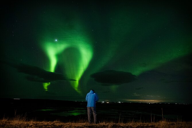 From Reykjavik 4x4 Minibus Northern Lights with Photo and Cocoa - Cancellation protection and the risk of bad weather
