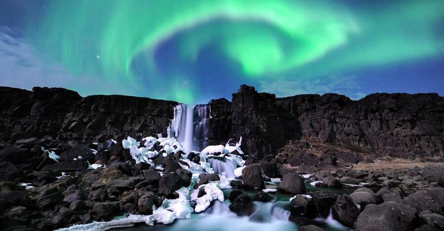 From Reykjavik: Golden Circle and Northern Lights Combo - Geysir and Strokkur: quick drama, limited variety