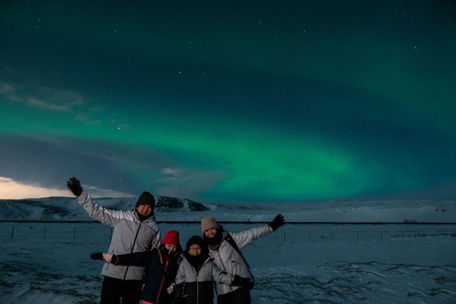 From Reykjavik: Northern Lights Guided Tour with Photos - Timing, weather, and pickup details