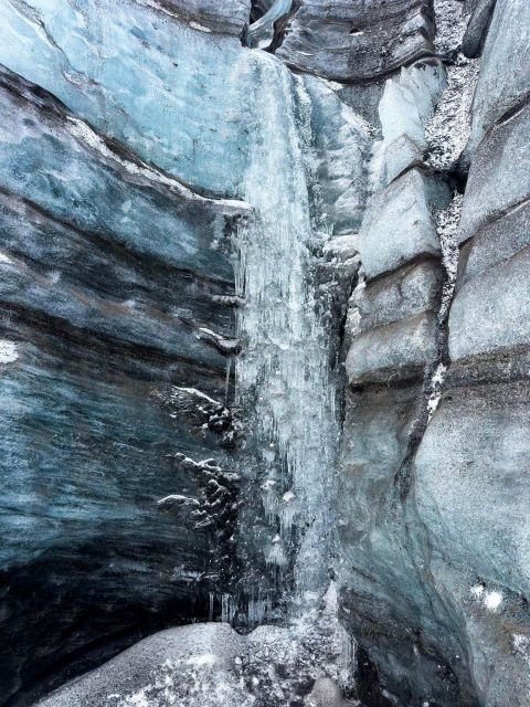 From Vik: Katla Ice Cave Small-Group Tour - Inside the cave: blue ice, black ice, and modest size