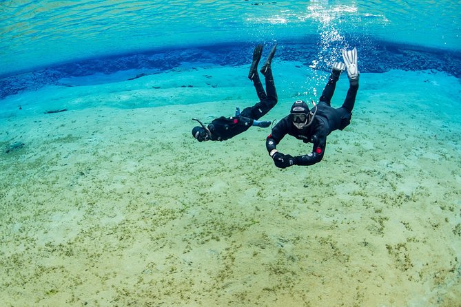 Golden Circle & Silfra Snorkeling Small-Group Supersaver Combo - Getting into the Silfra drysuit