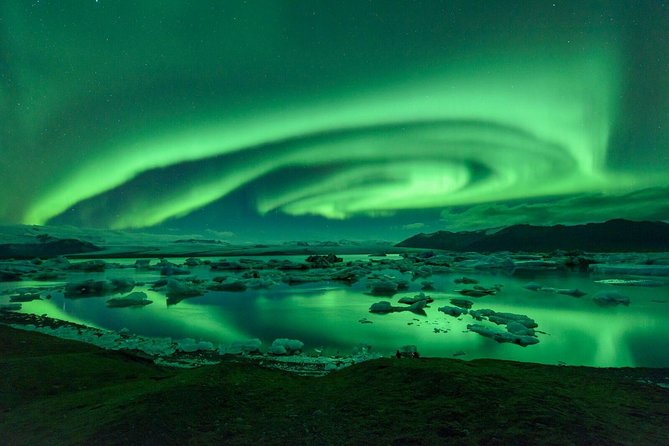 Northern Lights Guided Bus Tour from Reykjavik - Pickup, return, and small logistical risks