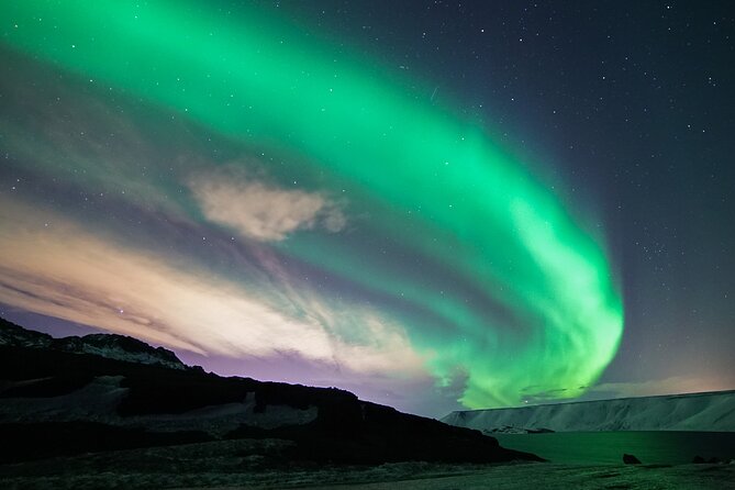 Northern Lights Minibus Tour with Hot Cocoa, Blankets & Photos - What seeing the Northern Lights can really look like