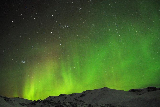 Northern Lights Minibus Tour with Hot Cocoa, Blankets & Photos - How the four-hour aurora hunt works