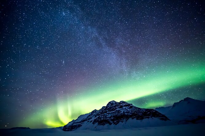 Northern Lights Small-Group Tour with Free Photos & Hot Chocolate - Chasing clear skies beyond Reykjavik