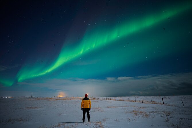 Northern Lights Tour with Photos, Snacks, Warm Snowsuits, Chairs - The value of the $212 price