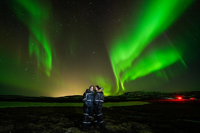 Northern Lights Tour with Photos, Snacks, Warm Snowsuits, Chairs - Waiting for the lights with hot chocolate and Icelandic snacks