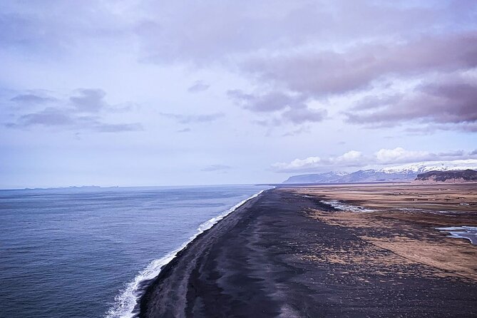Private Iceland South Coast with Glacier Hike Tour - Vikurfjara Black Sand Beach: volcanic shore and powerful surf