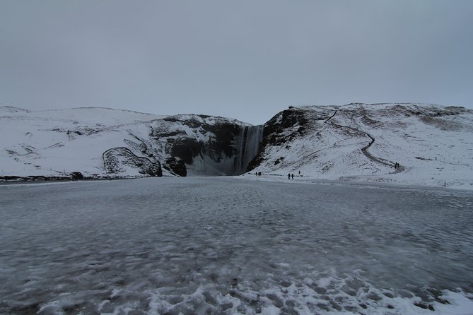 Private Superjeep Full-Day South Coast and Eyjafjallajokull Volcano Sights - Black sand, Atlantic surf, and the cliffs near Vik