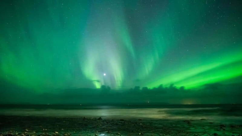 Reykjavik: Northern Lights Adventure Tour with Hot Chocolate - Leaving Reykjavik’s city lights behind