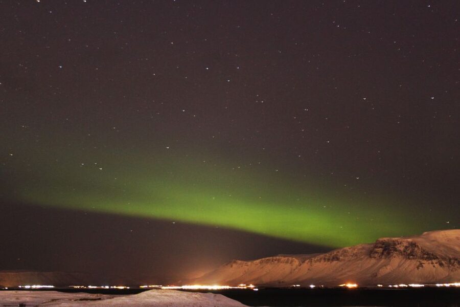 Reykjavík: Northern Lights Cruise - The Imagine Peace Tower from the water