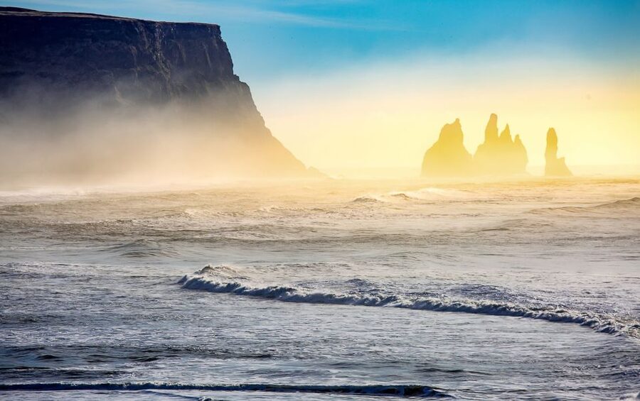 Reykjavík: South Coast Waterfalls, Black Sand & Glacier Tour - Skógafoss and the force of a 60-meter drop