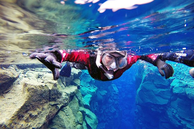 Silfra Drysuit Snorkeling Tour with Free Photos - From Reykjavik - Who should book this experience
