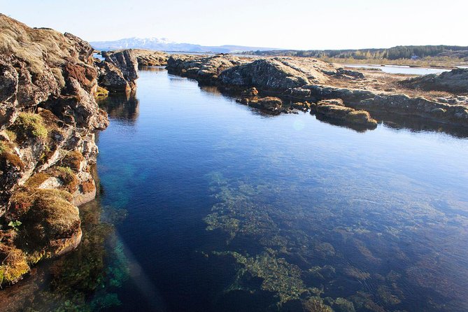 Silfra Drysuit Snorkeling with Free Photos - Meet on Location - What the guide adds to the experience