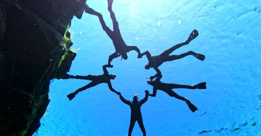 Silfra: Half-Day Snorkeling Day Trip with Underwater Photos - The first look into Silfra’s clear water