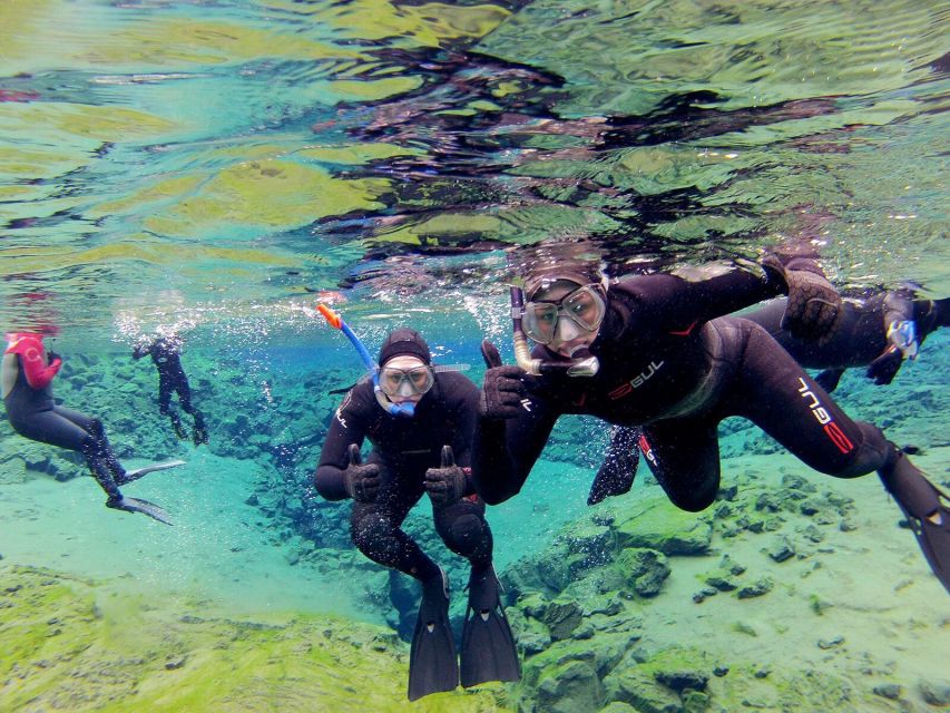 Silfra: Half-Day Snorkeling Day Trip with Underwater Photos - Floating between the American and Eurasian plates
