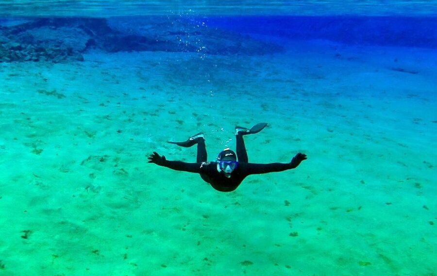 Silfra: Half-Day Snorkeling Day Trip with Underwater Photos - The final lagoon and the blue finish