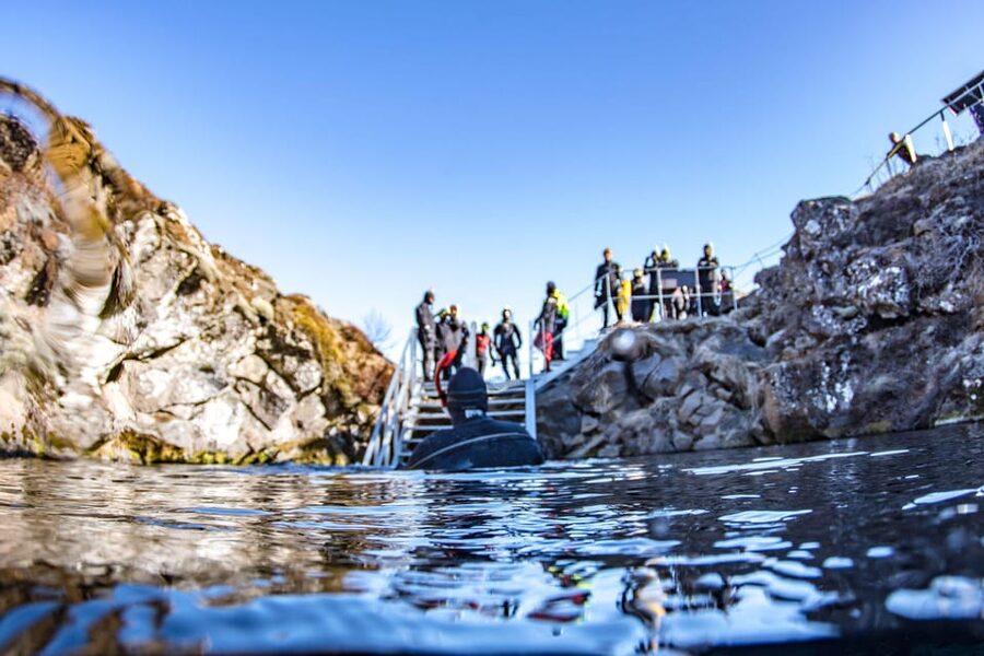 Silfra: Snorkeling Tour Between Tectonic Plates - Getting into the water in a dry suit