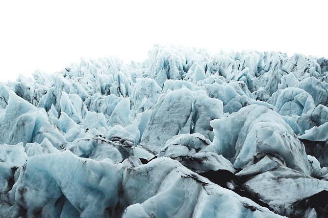 Skaftafell: 4h Small Group Glacier Hike with Guide and Transfer - Gear, boots, and weather