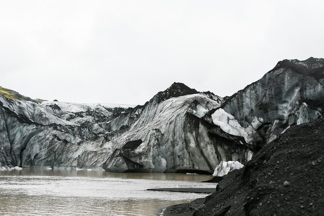South Coast Tour Private Epic Adventure - Sólheimajökull brings you close to Icelandic ice